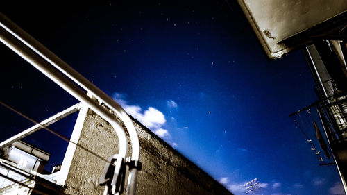 Low angle view of building against blue sky