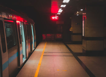 Train at railroad station at night