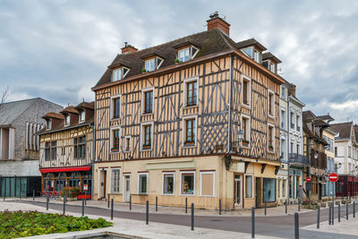 Low angle view of buildings against sky