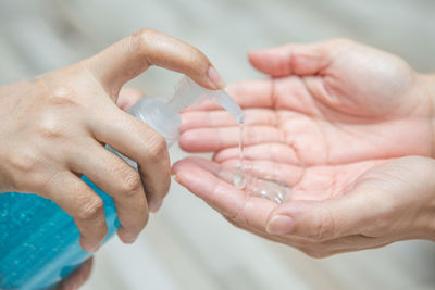 Close-up of woman holding hands