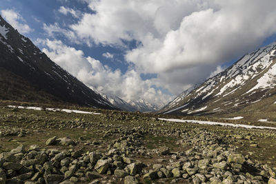 Scenic view of snowcapped mountains against sky