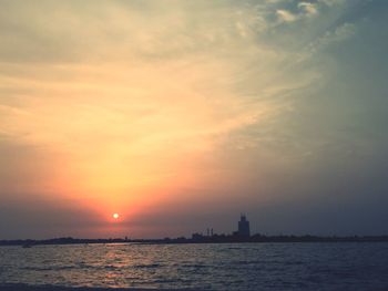 Scenic view of sea at sunset