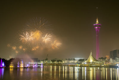 Firework display at night