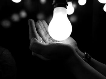 Close-up of illuminated light bulb