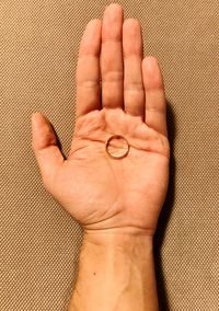 Close-up of hand holding hands