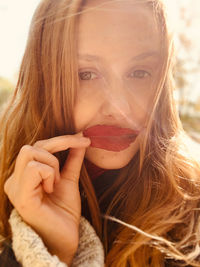 Close-up portrait of young woman