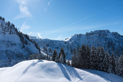 Idyllic shot of snowcapped mountains against sky