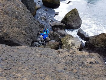 High angle view of man on rock