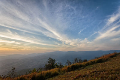 Scenic view of landscape against sky during sunset