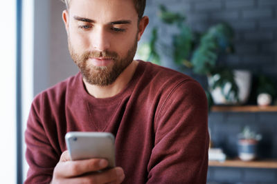 Young woman using mobile phone