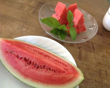 High angle view of fruits in plate on table