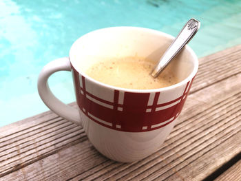 Close-up of coffee cup on table