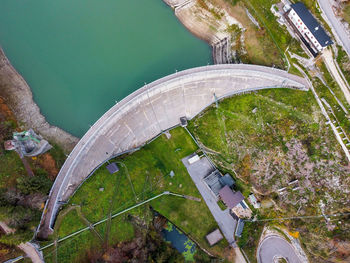 The round shape of a dam seen from above