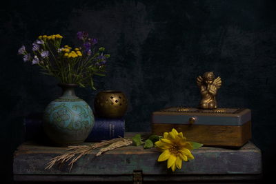 Close-up of flower vase on table