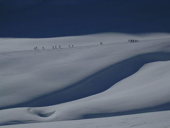 Scenic view of snowcapped mountain against sky