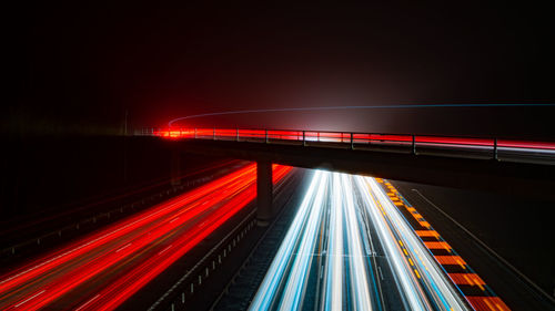 Light trails on bridge at night