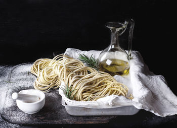 Close-up of food on table against black background