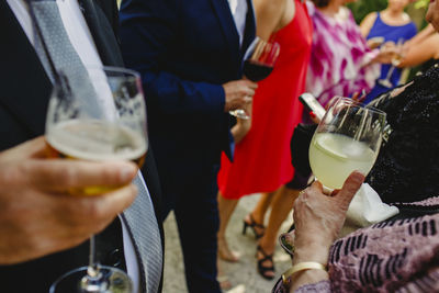 Group of people in drinking glass