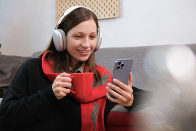 Young woman using mobile phone