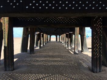 Underneath view of pier at beach