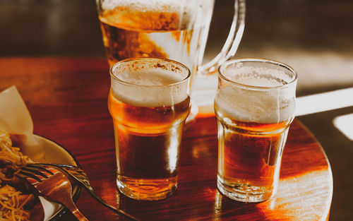 Close-up of beer in glass on table