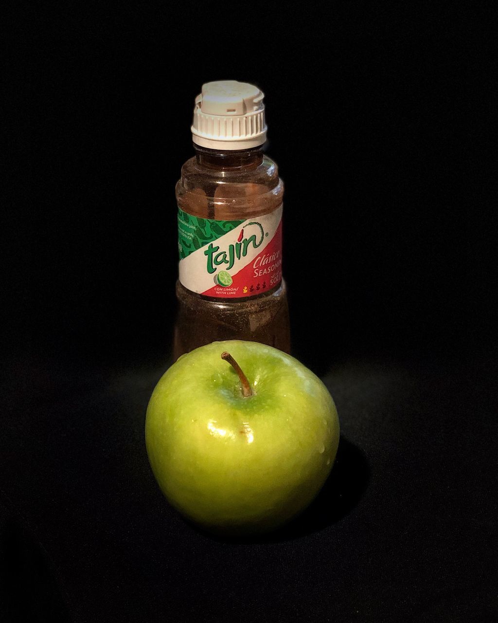 black background, healthy eating, indoors, food and drink, food, fruit, studio shot, wellbeing, apple - fruit, green color, still life, freshness, close-up, no people, container, communication, text, cut out, copy space, apple