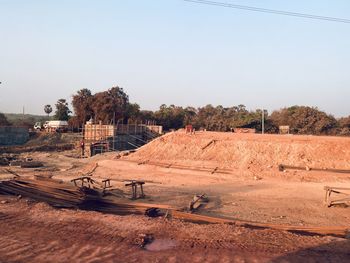 Scenic view of field against clear sky