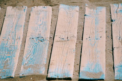 High angle view of wooden planks on table