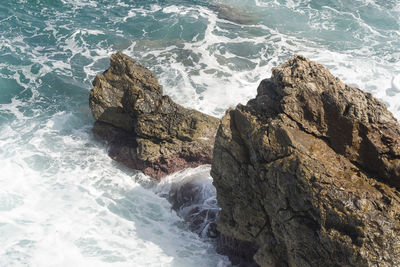 High angle view of rocks on beach