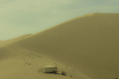 Scenic view of desert against sky