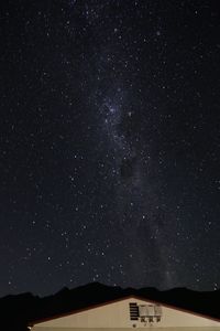 Scenic view of star field against sky at night