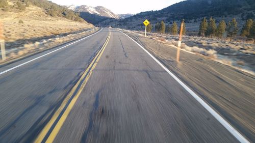 Road leading towards mountain