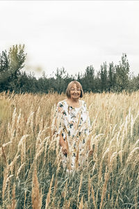 Full length of man standing in field