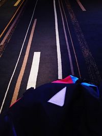 High angle view of multi colored umbrella on road