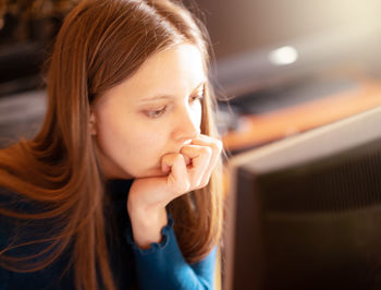 Young woman using laptop