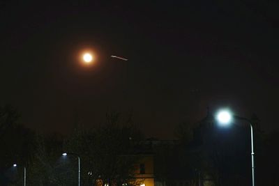 Low angle view of illuminated street light