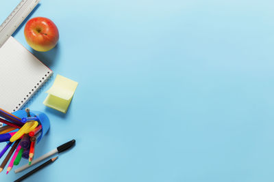 High angle view of colored pencils on table