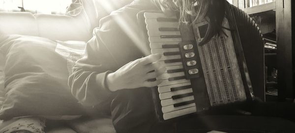 Man playing piano at home