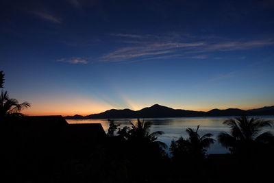 Scenic view of mountains at sunset