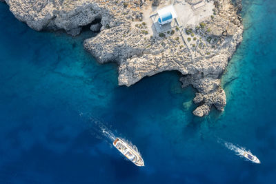 Drone aerial photograph of cape greko peninsula with agioi anargyroi church on the rocks. 