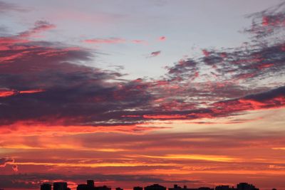 Low angle view of dramatic sky during sunset