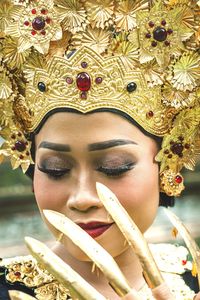 Woman wearing headwear and artificial nails