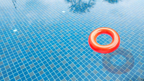 High angle view of inflatable ring in swimming pool