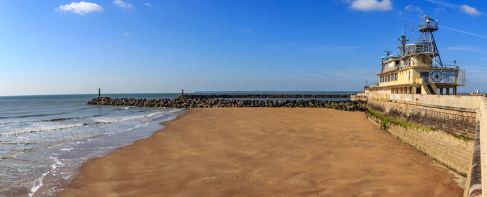 Pier over sea against sky