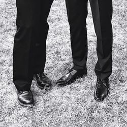 Low section of men standing outdoors