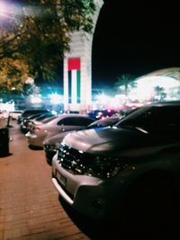 Close-up of car on street at night