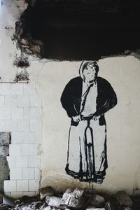 Close-up of statue against wall