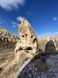 Rock formations against blue sky