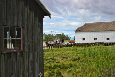 House on field against sky