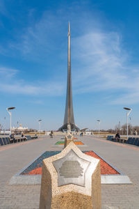 Monument in city against sky